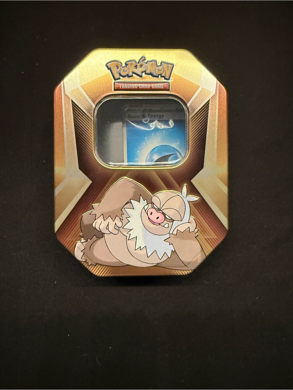 Pokemon Slaking tin with energy bundle cards inside